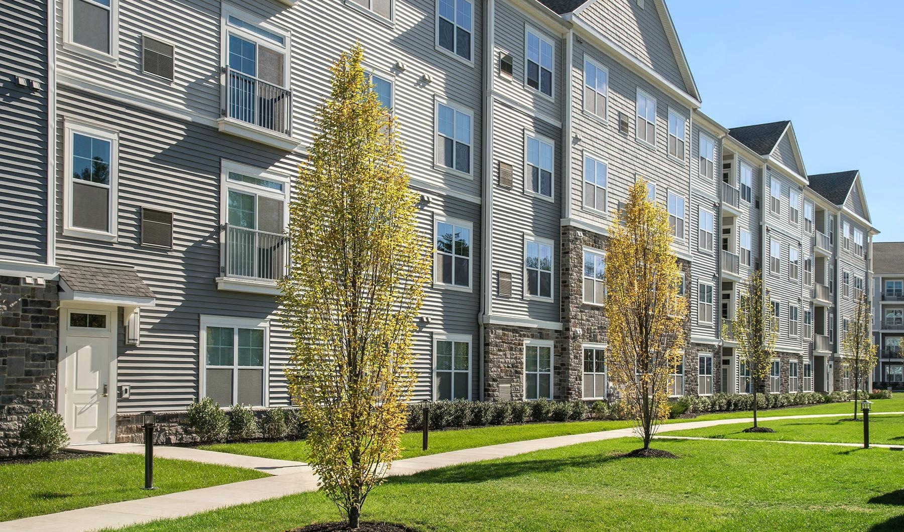 a building with trees in front of it
