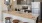 a kitchen with a marble island and stools